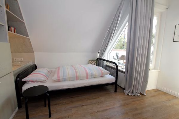 Zweites Schlafzimmer mit Einzelbett